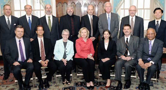 Hillary Clinton (seated, middle), Thomas Miller (standing, second from right) with other Jefferson Science Fellows